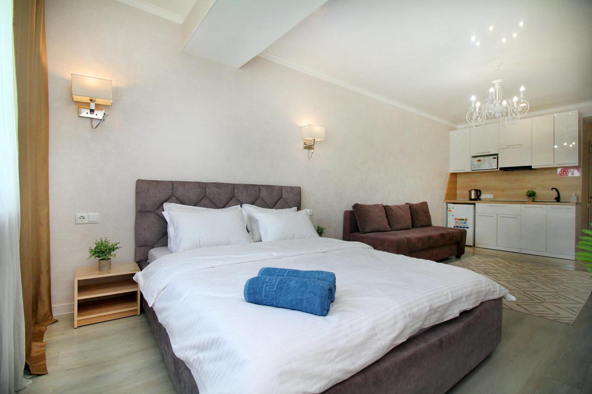 Almaty Cozy Apart Hotel מראה חיצוני תמונה