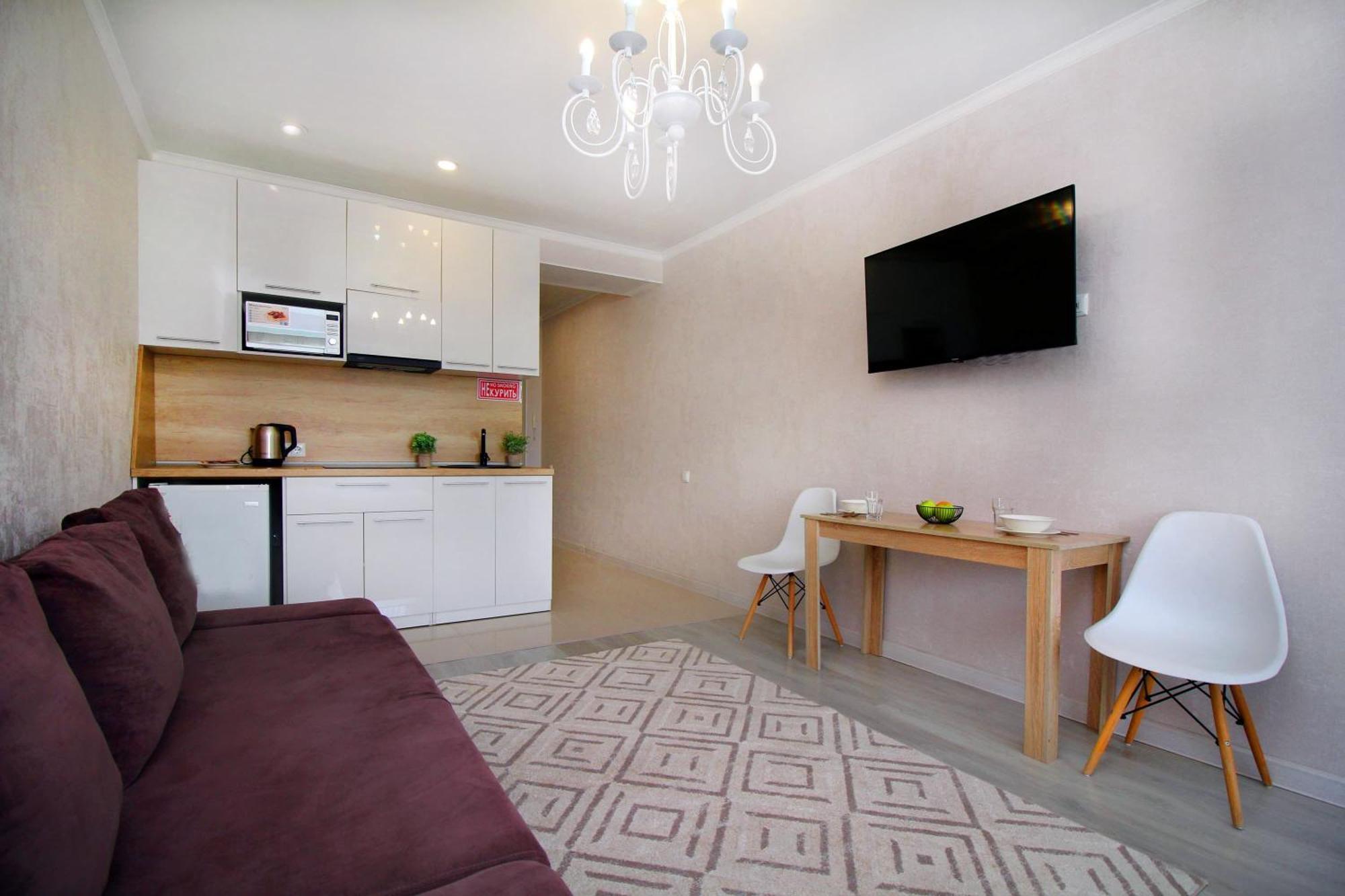 Almaty Cozy Apart Hotel מראה חיצוני תמונה